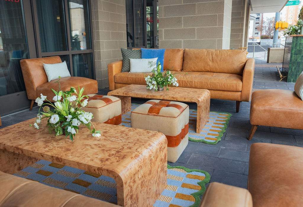 a living room filled with lots of furniture