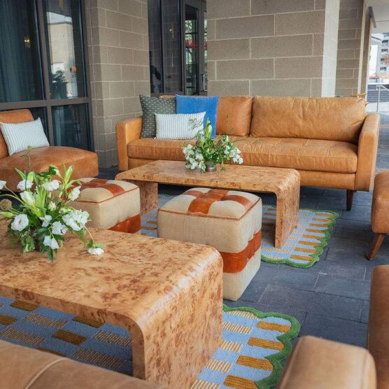 a living room filled with lots of furniture