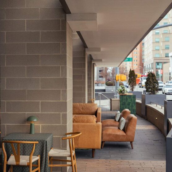 outdoor seating area with city street in the background