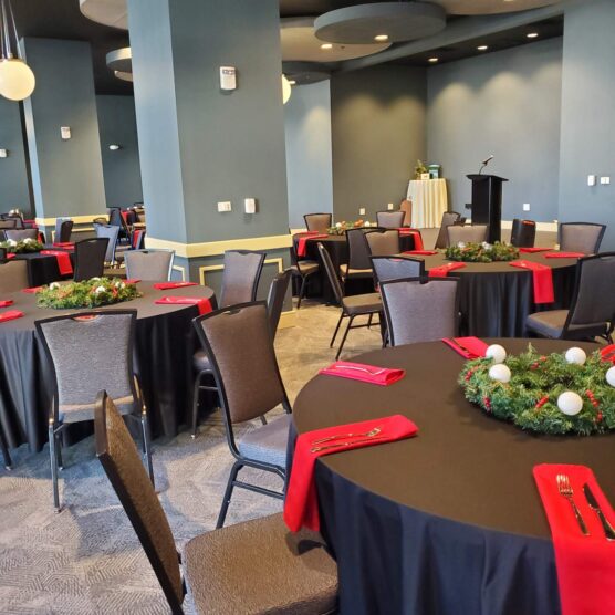 tables and chairs set for a meal