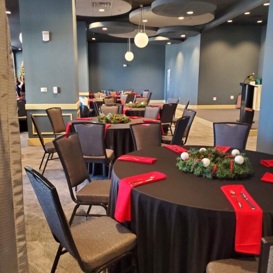 tables and chairs set for a meal