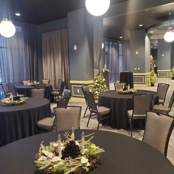 tables and chairs set for a meal