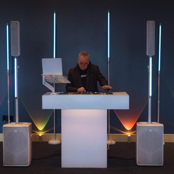 a man standing behind a lectern